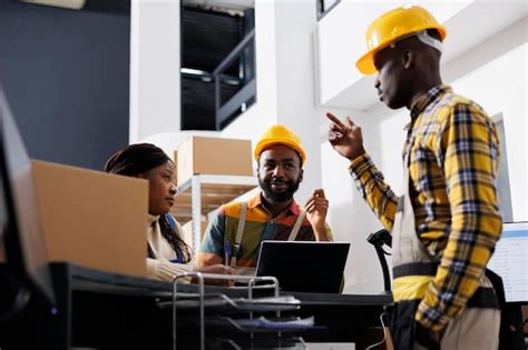 Free Photo African American Logistics Managers Team Dicussing Goods