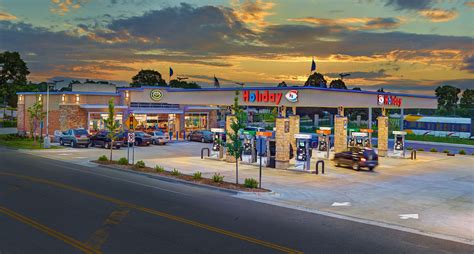Holiday Gas Station Pumps Store In Background Architectural Photo